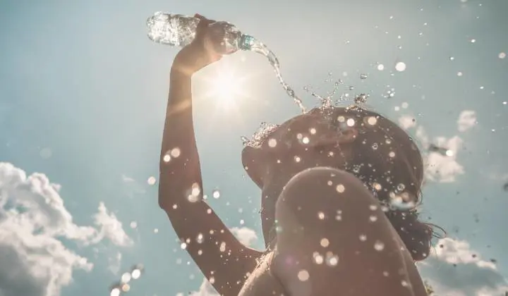 Woman hydrating herself