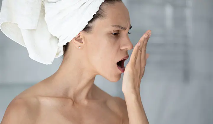 Bad breath is often a symptom of poor oral hygiene